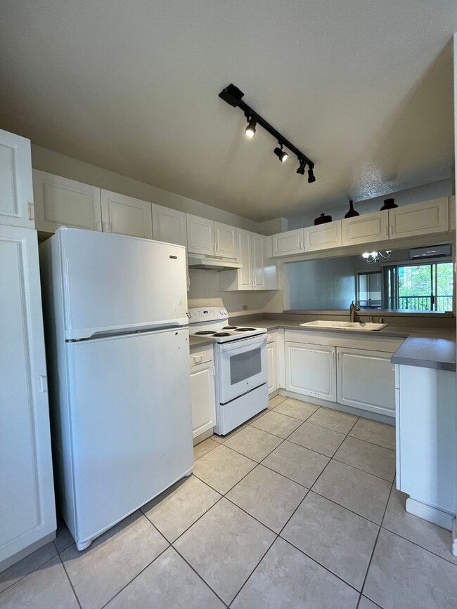 Photo - COUNTRY CLUB VILLAGE WITH 2 ASSIGNED PARKING Unit 313