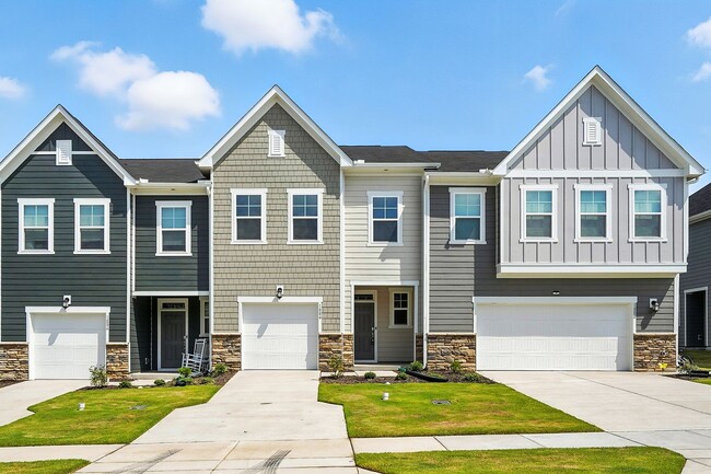 Building Photo - BRAND NEW TOWNHOME Available now, Depot 49...