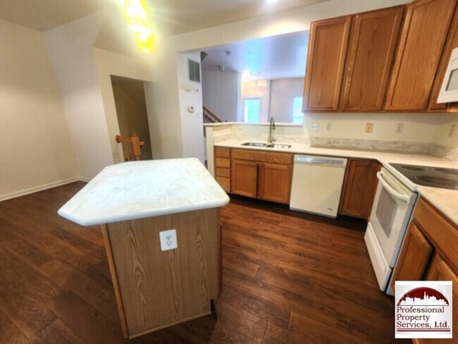 Photo - PRICE CORRECTION! Stylish Three-Level Bric...