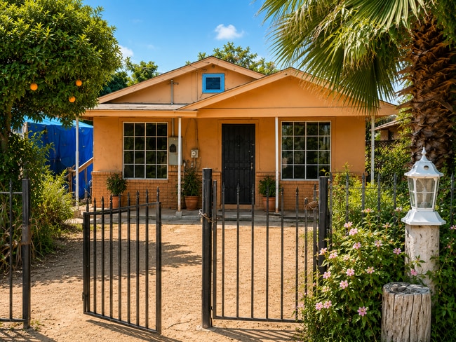Building Photo - 7075-7077 N Weber Ave Unit 7077