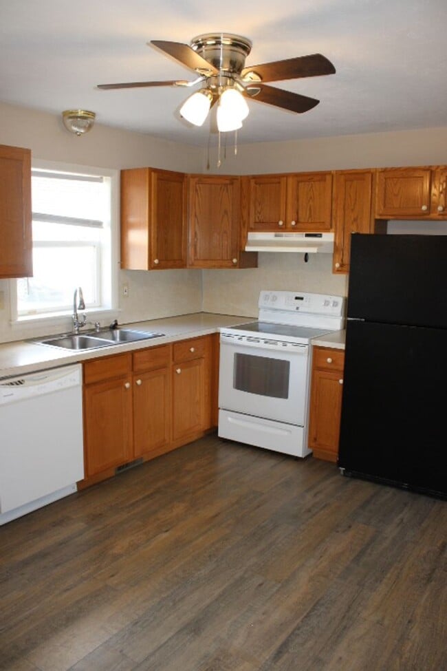 Photo - Move-In Ready 2BR Townhouse w/ Central AC & Off-Street Parking
