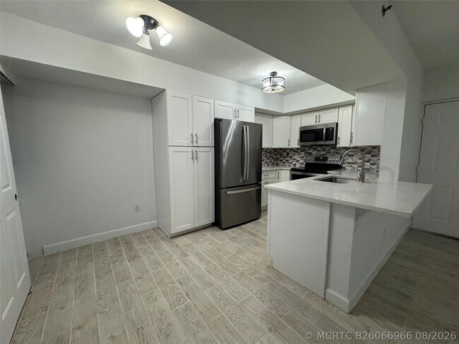 Building Photo - 5620 NW 61st St Unit 1201