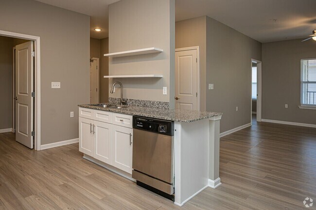 Photo - **Summer Leasing Promotion at Turtle Creek** Unit 1-205