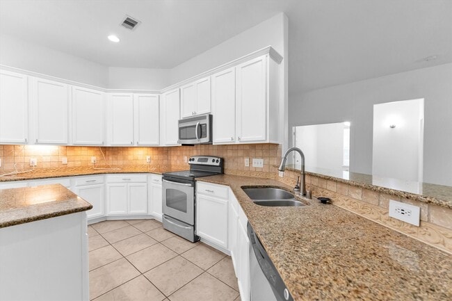 14823 Yellow Begonia Dr