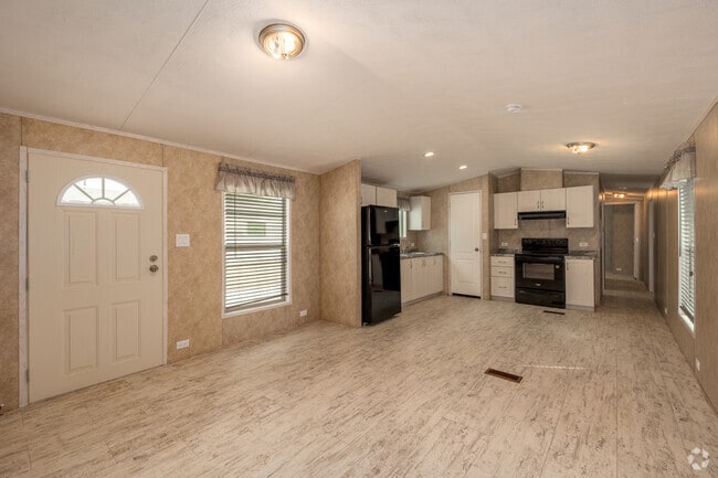 3 habitaciones, 2 baños - 1000 pies cuadrados - Sala de estar - Flamingo Flats