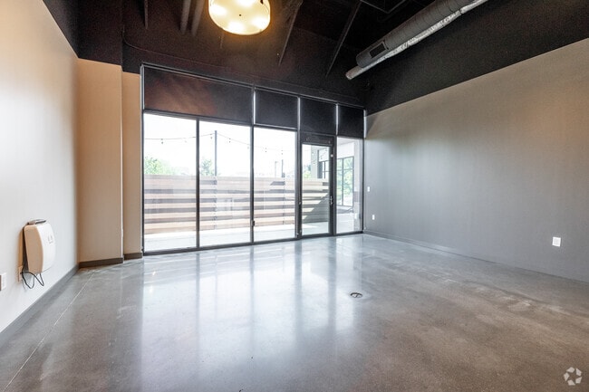 1BR, 1BA - 773 SF - Industrial - Living Room - West Glen Town Center Apartments