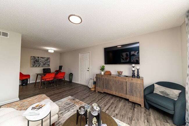 Spacious living room with hardwood-style flooring