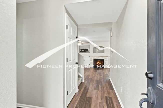 Photo - Spacious 4-Bedroom Home with a Finished Basement, 2 car garage, EV Charger and Low Maintenance, E...