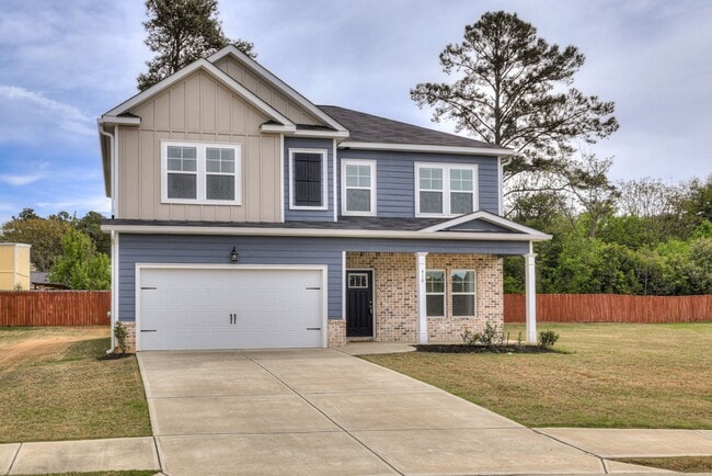 Photo - Discover comfort and convenience in this spacious 4-bedroom home, brimming with amenities, locate...