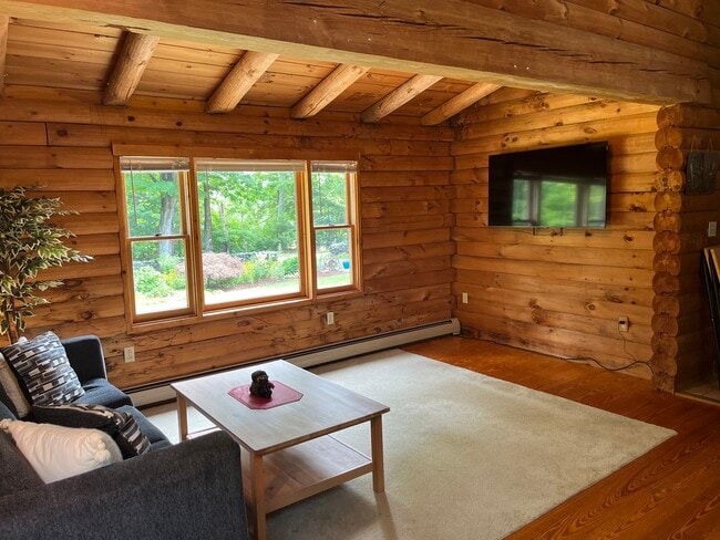 Livingroom - 137 Marshall St Unit Log cabin apartment