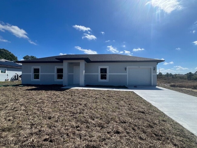 Building Photo - NEW CONSTRUCTION-  Modern 3 Bed / 2 Bath Home in Lehigh Acres