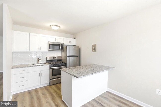 Building Photo - 1200 S Arlington Ridge Rd Unit 717