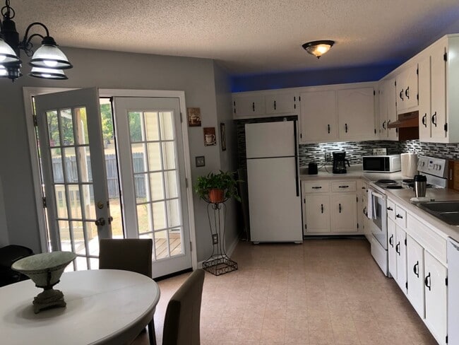 Beautiful kitchen with above and below cabinet lighting!