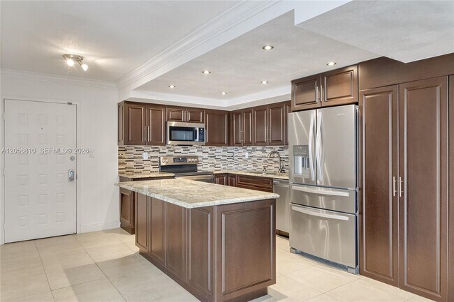 Building Photo - 6061 Collins Ave Unit 15D