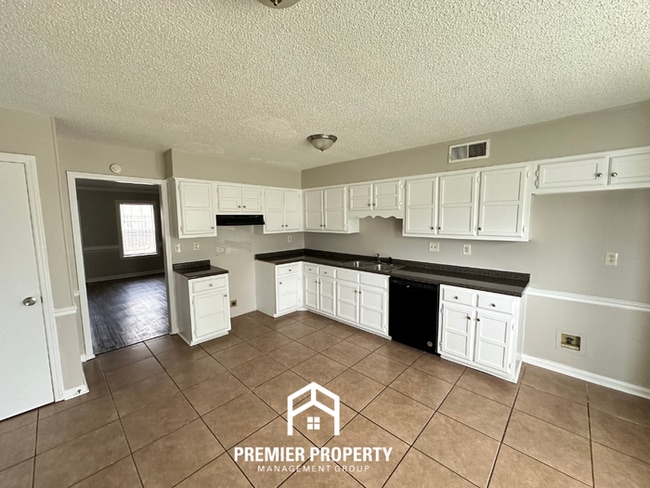 Photo - Charming 3BR/2BA Near Southwind | Vaulted Ceilings, Hardwood Floors & 2-Car Garage