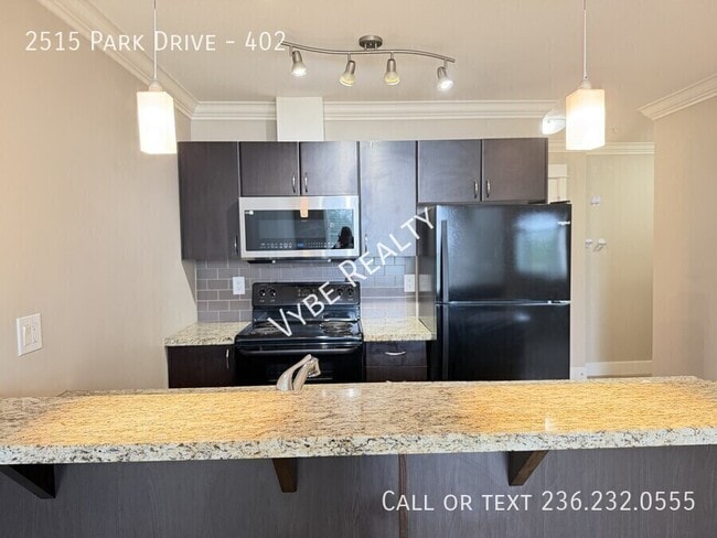 Photo - Top Floor - 2 Parking Spots and Pet Friendly Unit 402