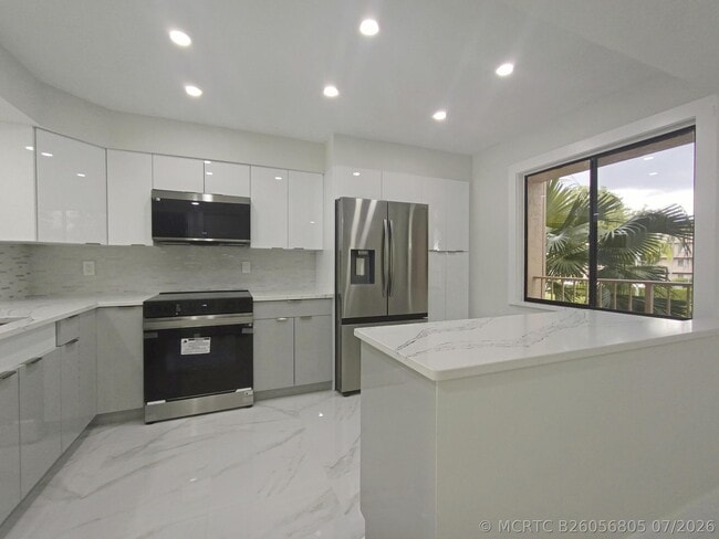 Building Photo - 7280 Amberly Ln Unit 207