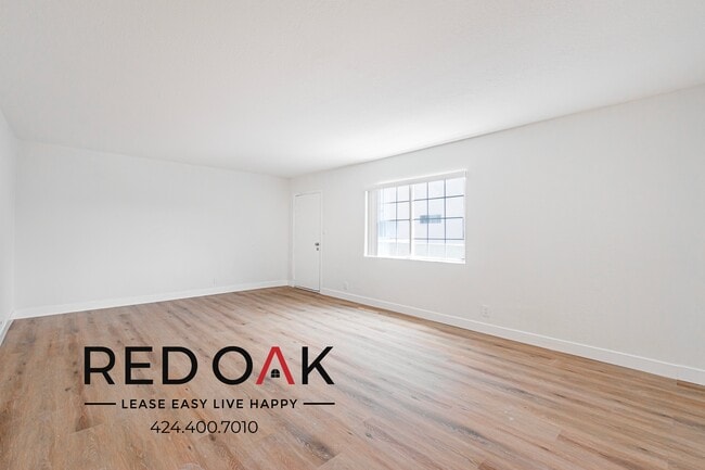 Building Photo - 6337 10th Ave