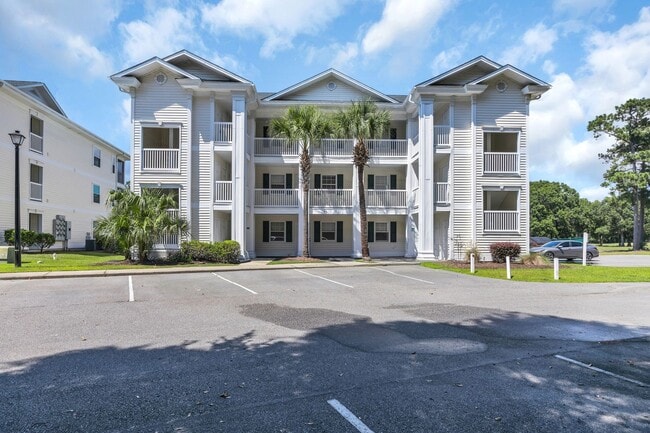 Building Photo - Charming 1BR Condo at Blue River Court – Pools, Tennis & More