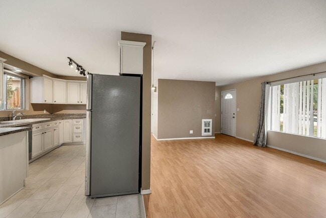 Photo - 4 Bedroom Home with Covered Parking & Fenced Backyard