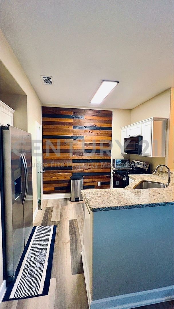 Photo - Nicely Updated 3/2 Fourplex Unit in Weathe...