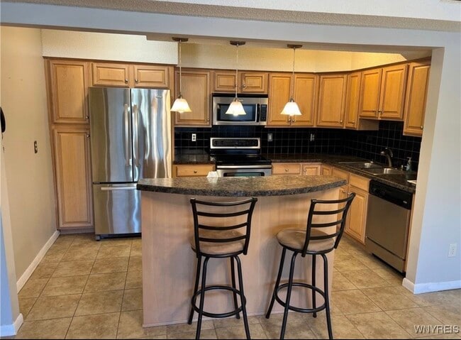 Building Photo - 8421 Buffalo Ave Unit 14