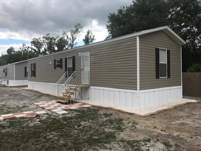 Photo - Two-bedroom Home with Water, Garbage, and Lawncare Included