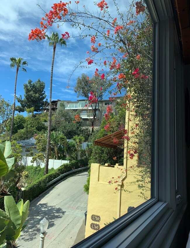 View from living room couch to bedroom deck - 1760 N Fairfax Ave