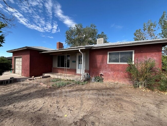 Building Photo - 1601 N Chaco Ave
