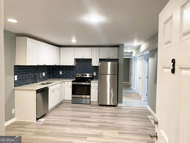 Building Photo - 1891 Tremont Dr NW Unit #3