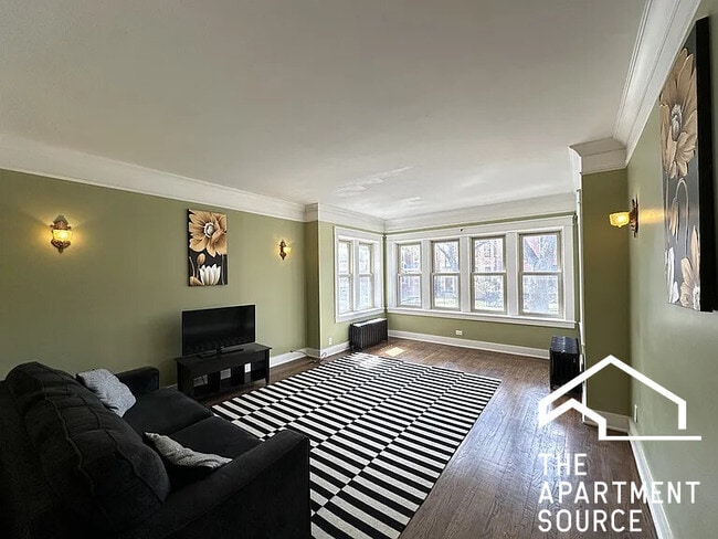 Building Photo - 5023 N Ridgeway Ave Unit 1