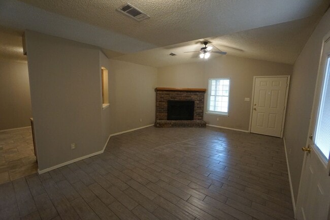 Photo - 3 Bed 2 Bath 1 Car Garage with Yard Care Included, Refrigerator Provided.