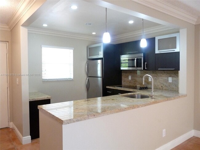 Photo - 7701 Camino Real Unit A202