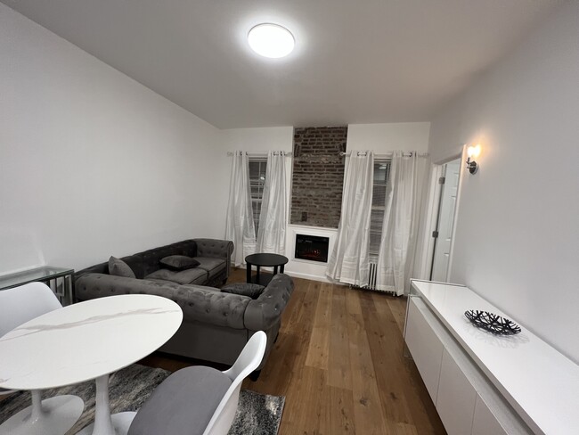 239 W 12th St