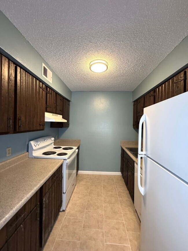 Photo - Centrally located freshly painted condo is... Unit 93