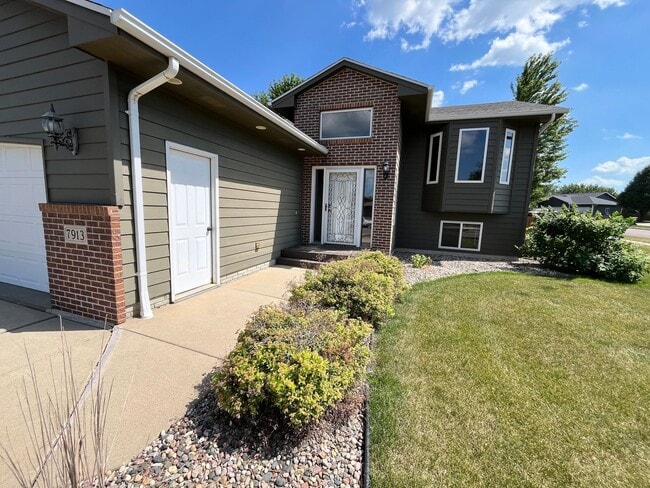 Photo - Stunning 4 Bed/2 Bath with 3 Car Garage and Fenced in Yard!