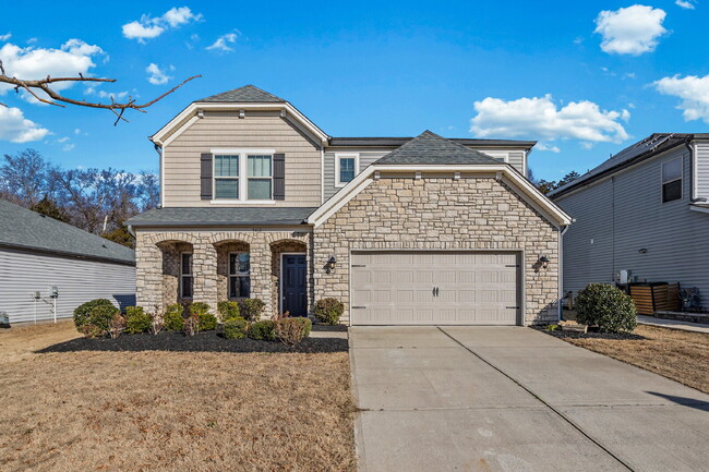 Building Photo - Classic finishes paired with an open, versatile layout!