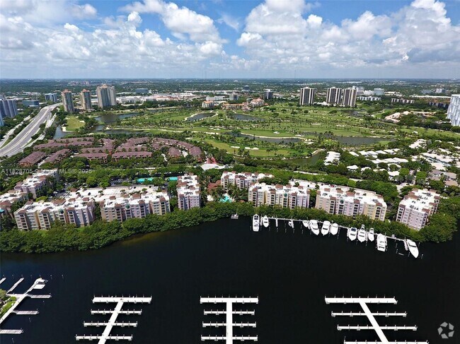 Building Photo - 19655 E Country Club Dr Unit 6504 Rental
