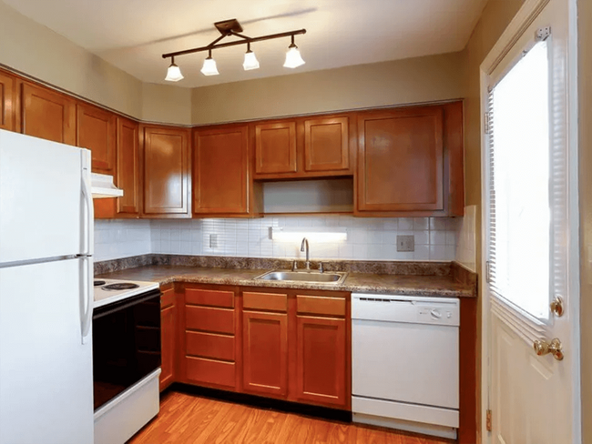 Fully-Equipped Kitchen with Dishwasher - Arlington Village Apartments