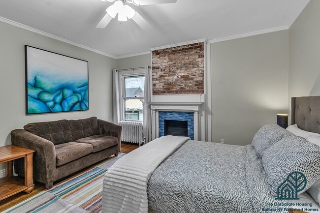 Photo - Furnished 4-Bedroom, 2.5-Bath Apartment near Elmwood Village Unit 1