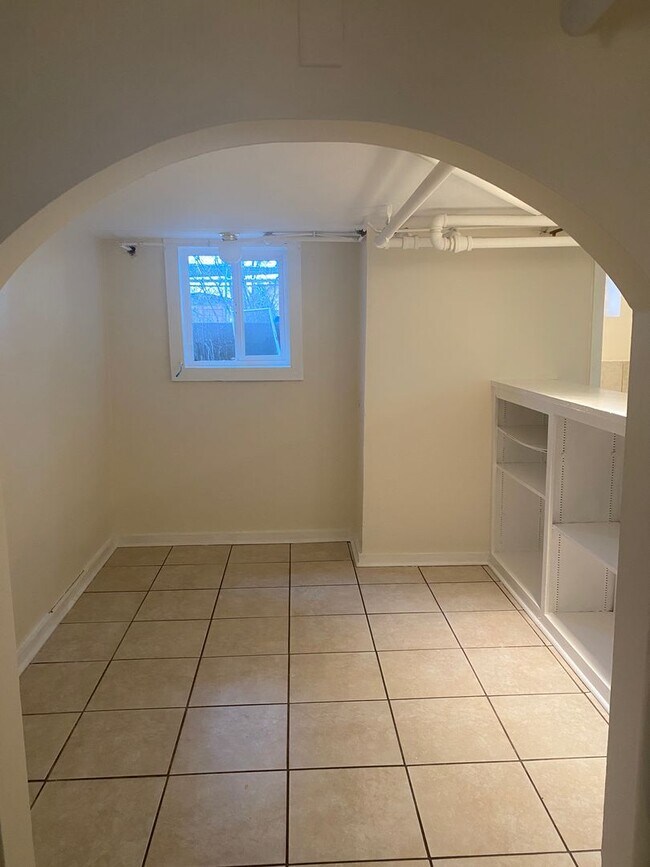 Photo - 2 Bed / 1 Bath Garden-Level Apartment – Available Early April!