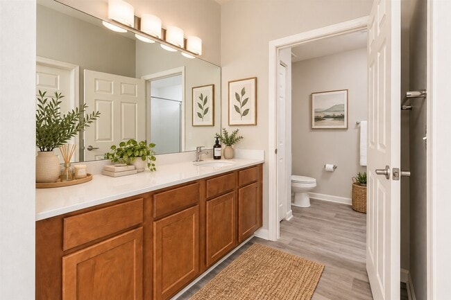 Step into the serene elegance of Delray Bay’s stunning bathroom. Featuring modern fixtures, beautiful cabinetry, and ample natural light, this space is perfect for relaxation. Explore your new home today and enhance your lifestyle!