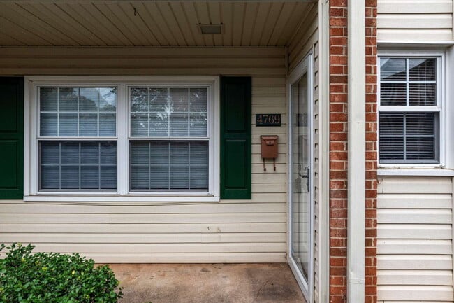 Photo - "Charming 2-Bed Condo in Greensboro with Spacious Layout, community clubhouse and POOL!"