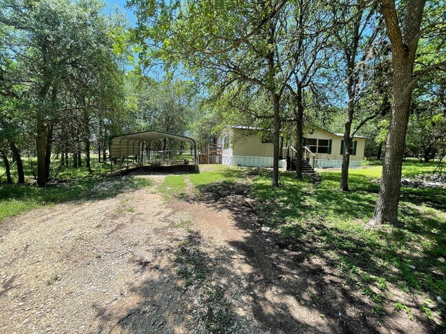 Photo - 3 bed 2 bath on one acre lot. New vinyl fl...