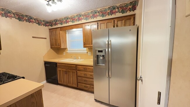 Photo - Welcome to this charming 3-bedroom, 2-bathroom duplex located in the vibrant community of Broken ...