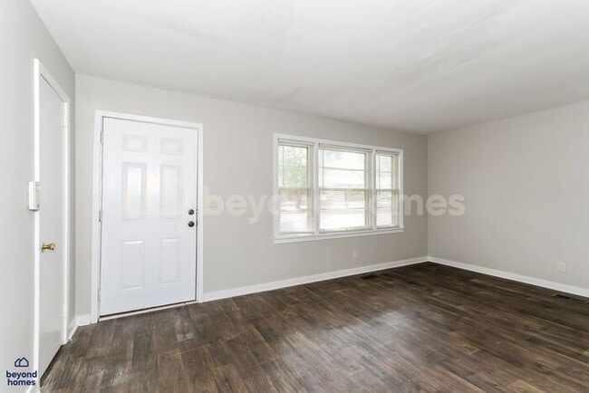 Photo - Updated Bungalow with Massive Deck and Fully Fenced Yard!