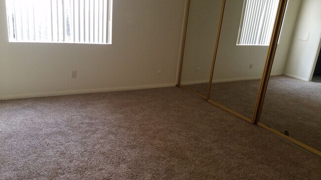 Photo - 3 bedroom, 2 bath, ground floor unit, and private patio. Unit 4