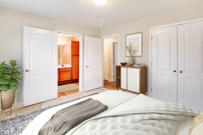 Experience luxury and comfort in this beautifully designed bedroom. - West Pointe