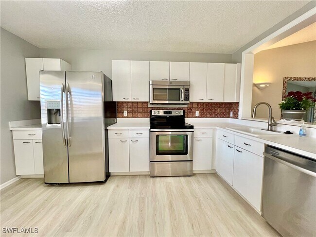 Building Photo - 7749 Jewel Ln Unit 202 Rental