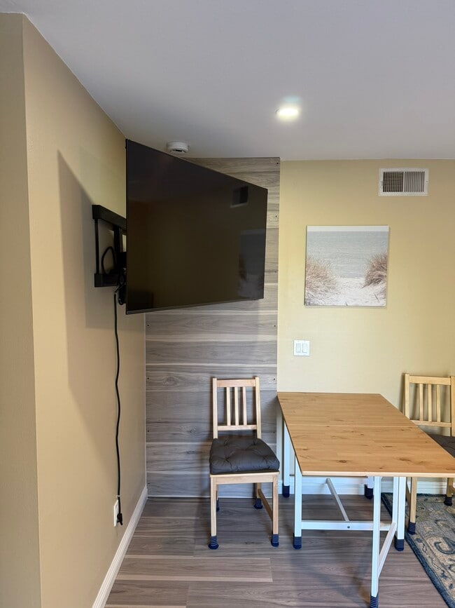 TV is secured to a tilting and rotating mount - 1977 Erbes Rd
